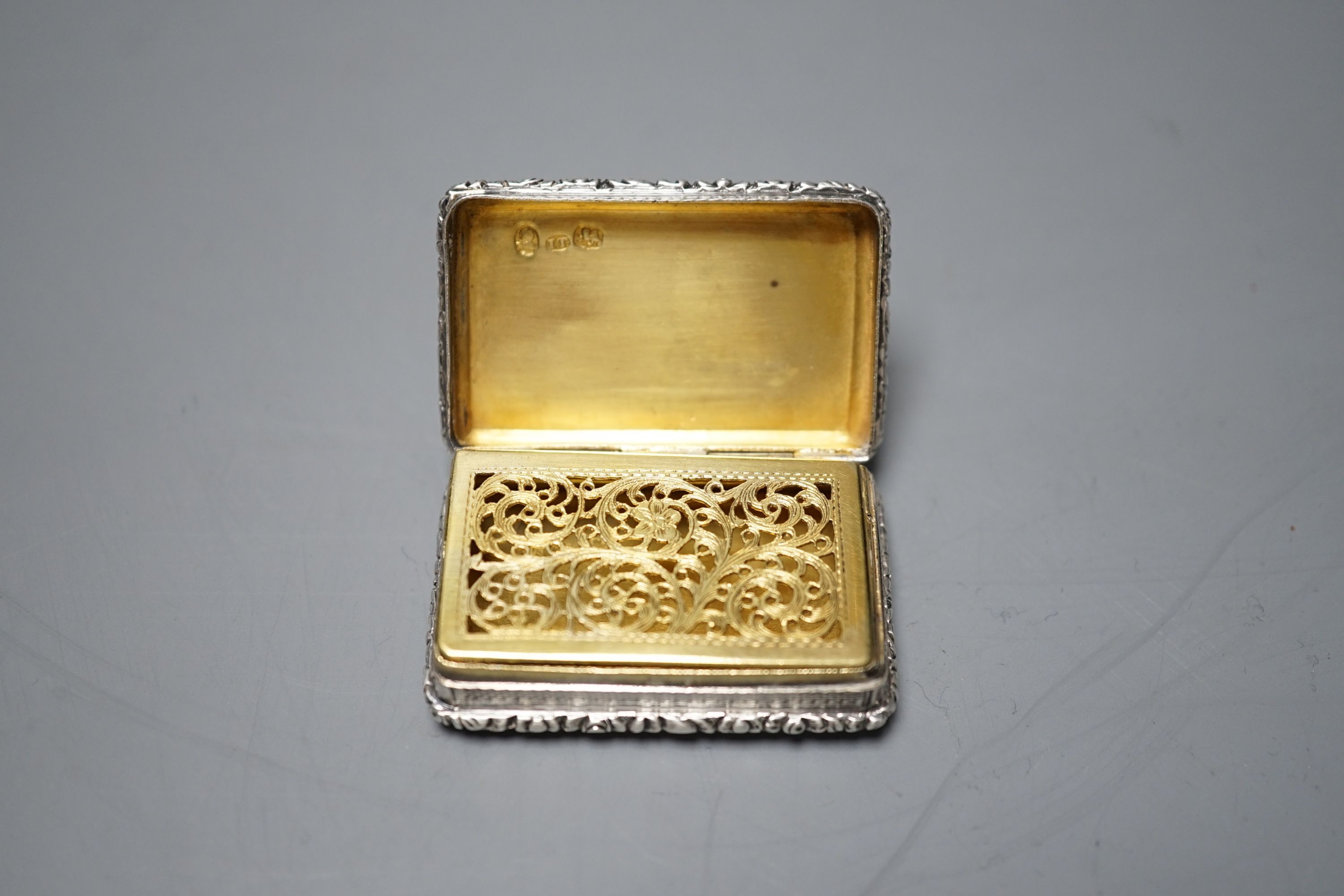 A George IV engine turned silver rectangular vinaigrette, John Thropp, Birmingham, 1826, 44mm.